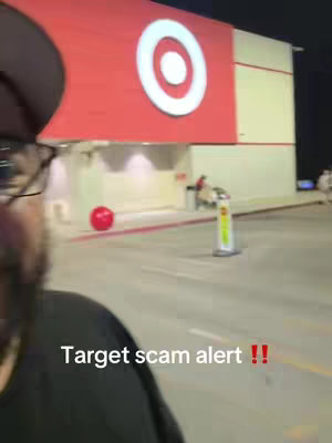 The cover image shows a man in the foreground with the partial view of the Target store facade with a large red bullseye logo as the background. The man is wearing a hat and glasses, partially obscuring his face. The text overlay, 'Target scam alert !!', appears at the bottom of the image.