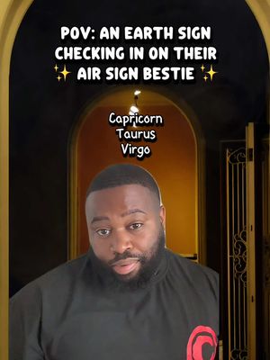 A man with a short beard and black shirt is centered in the frame with text overlays at the top and in the middle of the screen. The background is dark with what appears to be an archway.