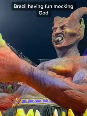 The cover image features a statue of an angry, demonic figure with red hues. The figure's face is contorted in a snarl, with sharp teeth and a furrowed brow. The background is a dark, blurry setting.