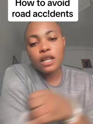 A woman with a shaved head is centered, looking up and speaking. A text box at the top says, 'How to avoid road acc!dents'.