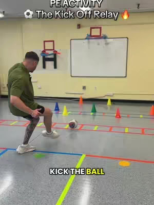 A man in a green shirt kicks a soccer ball in a gym. The text "PE ACTIVITY The Kick Off Relay" is in black and white. There are colorful cones in the background.