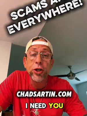 A man in a red shirt and a cap with text overlays relating to scams. The background shows a ceiling and a ceiling fan. The man is looking directly at the camera.