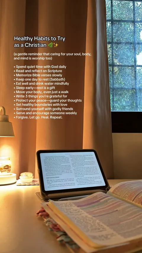 The image showcases a workspace with a tablet and a book at the center, suggesting a study or reflection space. Soft light illuminates the scene, with a window and curtains in the background providing a natural element.