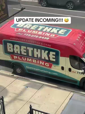 A photo of a white plumbing van parked on a city street. The van has a red top and teal base colors with the company name 'BAETHKE PLUMBING' prominently displayed. The text 'UPDATE INCOMING!!!' is overlaid at the top, within a speech bubble and a few emojis.
