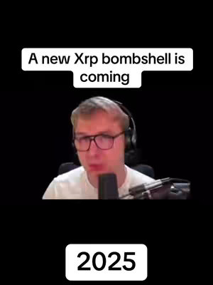 A video cover with a black background. The primary visual is a man wearing glasses and a headset, appearing to be speaking into a microphone. Above him is a white rectangular box with the text "A new Xrp bombshell is coming". Below the man in a similar white outlined rectangle is the year "2025".