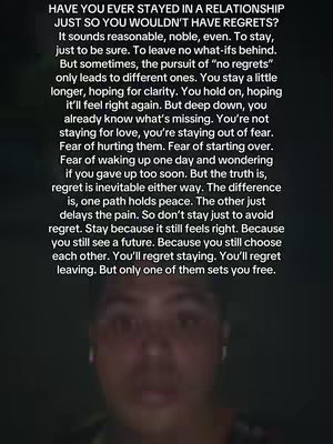 A selfie-style shot with the creator’s face visible at the bottom of the frame. Above them is a block of text in white font against a dark, possibly blurred background, suggesting the text is a backdrop.