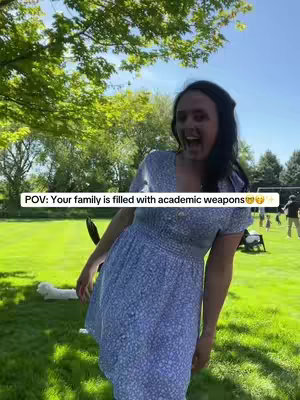 A woman stands in a grassy yard with trees in the background, looking at the camera with an excited expression. Text is overlaid describing the content of the video.