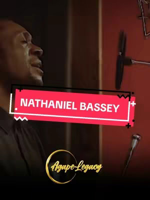 The cover image features a man singing into a microphone, with a red banner overlay displaying the text 'NATHANIEL BASSEY'. Below this is a gold logo that reads 'Agape-Legacy'. The background appears to be a recording studio setting.