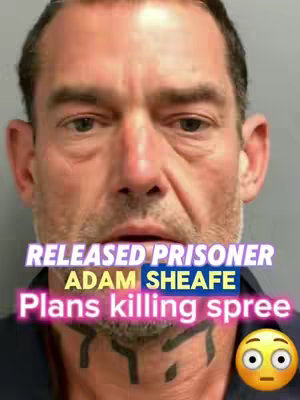 A mugshot of a man with dark hair and a closely shaved face. The man has a grim expression. Across his neck is a unique tattoo. Text overlays the image, including the words "RELEASED PRISONER", "ADAM SHEAFE" followed by "Plans killing spree" with an emoji of a shocked face at the bottom right.