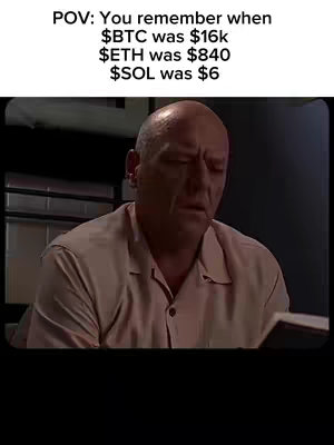 The image is a screenshot from a TV show featuring an older man with a bald head, beige collared shirt looking down with a sad expression. The image is framed with a black border.