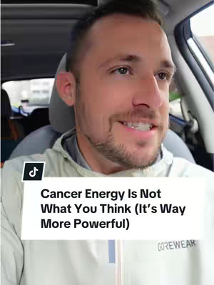 A man is filmed from the chest up inside a car, with a text overlay below his face. The background is blurred, showing the car's interior and some outdoor elements. The man is smiling and looking slightly off-camera. The text overlay is white, with a black TikTok logo in the top left corner.