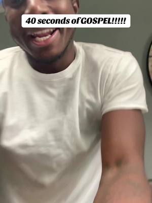A man is smiling, wearing a white t-shirt. The overlay text reads '40 seconds of GOSPEL!!!!!' The shot is well-lit.