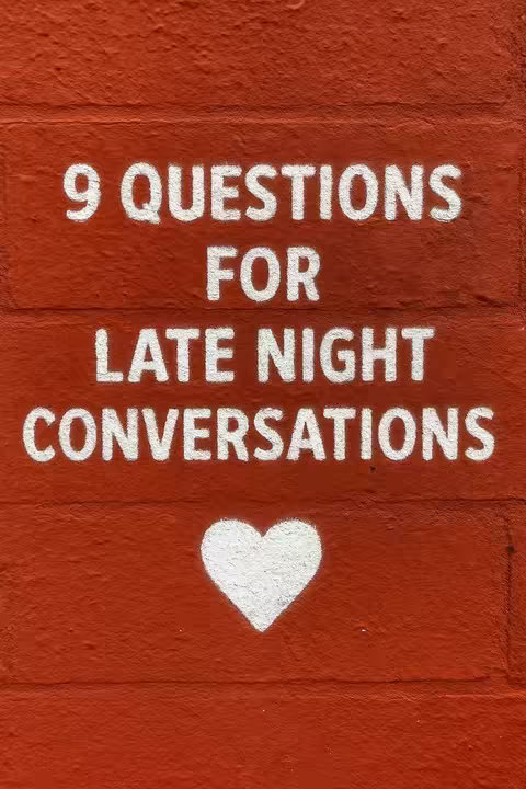 The image shows a red brick wall with white spray-painted text and a heart. The text reads '9 QUESTIONS FOR LATE NIGHT CONVERSATIONS.' Below the text is a white heart.