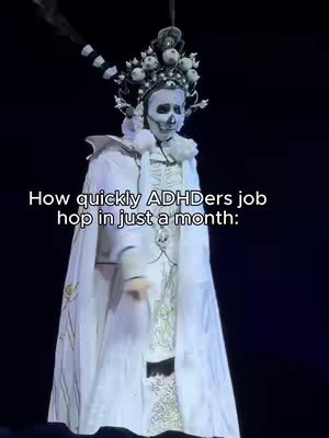 An image of a person wearing an elaborate white and gold costume and makeup, with a skeletal face and elaborate headpiece, against a dark background. Text overlayed on the bottom.