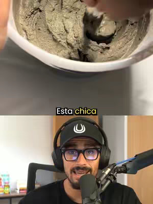 The image shows a split-screen layout. The top half shows a white bowl containing a grey, thick substance, possibly cement or a similar material. The substance is being mixed with a hand. The bottom half displays a man wearing glasses, a black hat, and headphones. He is speaking into a microphone.