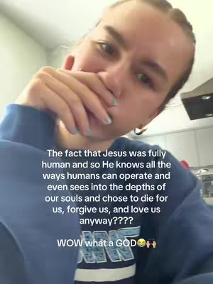 A selfie-style video cover featuring a woman covering her mouth with her hand, with text overlayed on top. She is in a well-lit indoor setting.