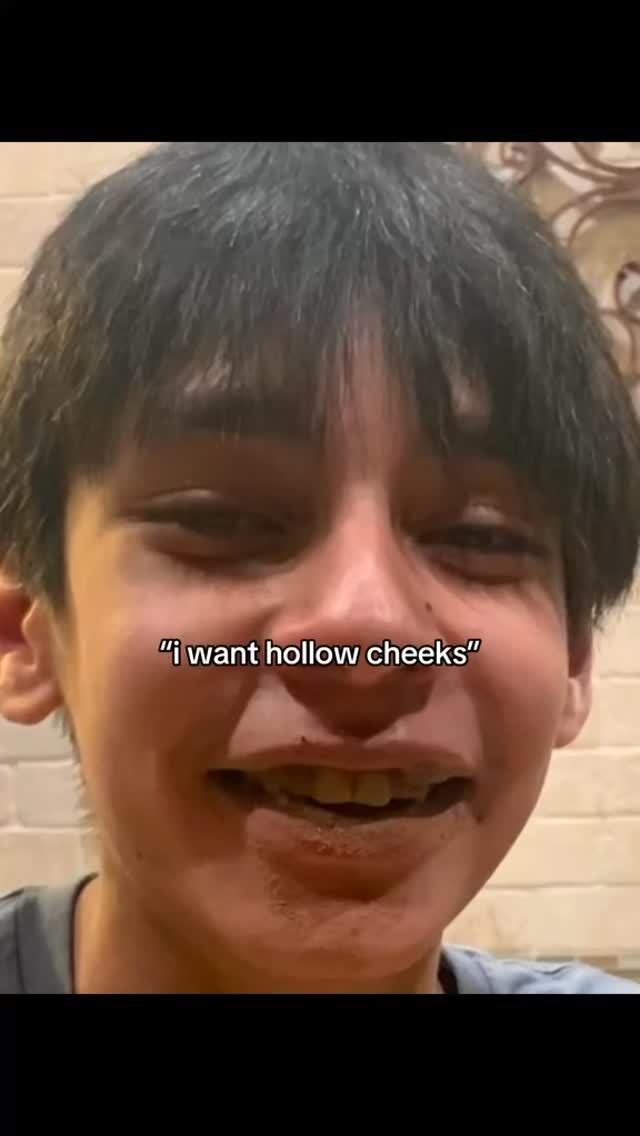 The cover image features a close-up of a person's face, likely a young male, with dark hair and a slight smile. The person appears to be speaking, and the background is blurred, with a text overlay at the center bottom of the image.