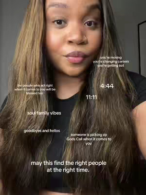 A selfie-style shot featuring a woman with long, wavy hair. Overlay text is scattered across the image in a handwritten style, including phrases and numbers. The woman looks directly into the camera with a neutral expression.