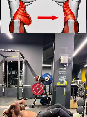 The image is a split-panel view. The top portion shows a diagram of abdominal muscles and the area being exercised, with a red arrow indicating the movement. The bottom half features a man in a gym exercising his abs. He is lying on a mat, with his legs in the air with his hands behind his head. There are exercise machines visible in the background, suggesting a workout routine is being demonstrated.