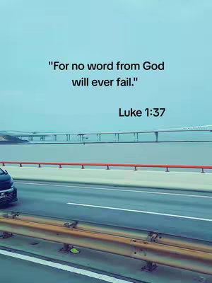 The image shows a road with a bridge or overpass in the background. The sky is a light blue color with text overlaid at the top.