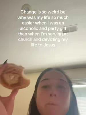 The cover image is a selfie taken from a slightly upward angle. The foreground features a person's face, partially obscuring the view of the background. The person is holding a partially eaten pastry in their left hand, with the food taking up a portion of the left side of the image and the person's face making up the lower right part. The background is the ceiling and a wall. On the ceiling, there's a circular ceiling fixture, and to the right, a long, narrow vent or similar component. White text is overlaid at the top, presenting a caption and question.
