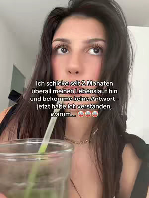 A woman with long dark hair looks up, appearing thoughtful. Text overlayed on the image poses a question about career, with the woman holding a glass. The composition is a selfie format, with focus on the woman in the foreground.