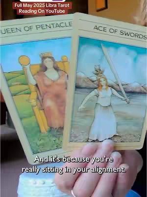 The cover image shows two tarot cards held by a hand with a light skin tone, and a caption that uses the tarot cards to predict something in the future. The focus is on the cards and what the prediction may hold.