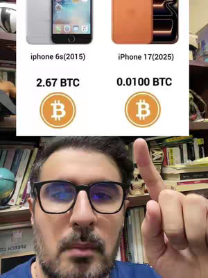 The cover image shows a man in front of a bookshelf pointing upwards. Above him is a graphic comparing two iPhones side-by-side. The graphic details iPhone 6s (2015) and iPhone 17 (2025) with respective Bitcoin values.