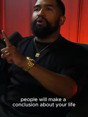 A man with a beard is speaking into a microphone. He wears a gold watch and ring. Text overlay at the bottom reads: 'people will make a conclusion about your life'. The background is a vibrant red.