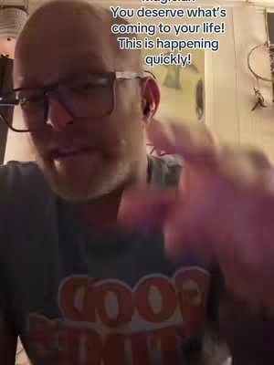 A man with glasses is looking directly at the camera in a selfie-style shot. Text overlays appears at the top.