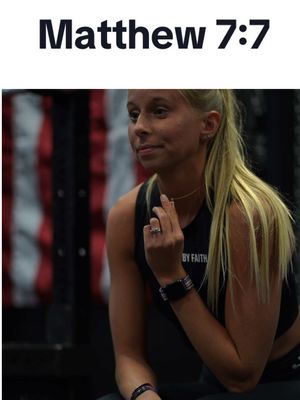 A woman with long blonde hair is seated, looking slightly off-camera. The background is blurred but includes dark, geometric shapes. The overlay text 'Matthew 7:7' is at the top in bold black font.
