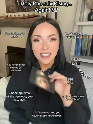 A young woman with black hair and makeup is centered in the frame, holding a dark card with a blurry image. Text overlays pop up on all sides of the woman, with other text and numbers floating nearby the woman.