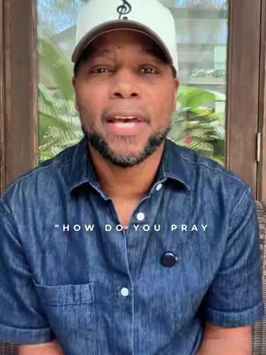 A man wearing a baseball cap and a denim shirt is speaking directly to the camera. Behind him is a blurred outdoor setting with green foliage visible through a window. The overlay displays the text "HOW DO YOU PRAY".
