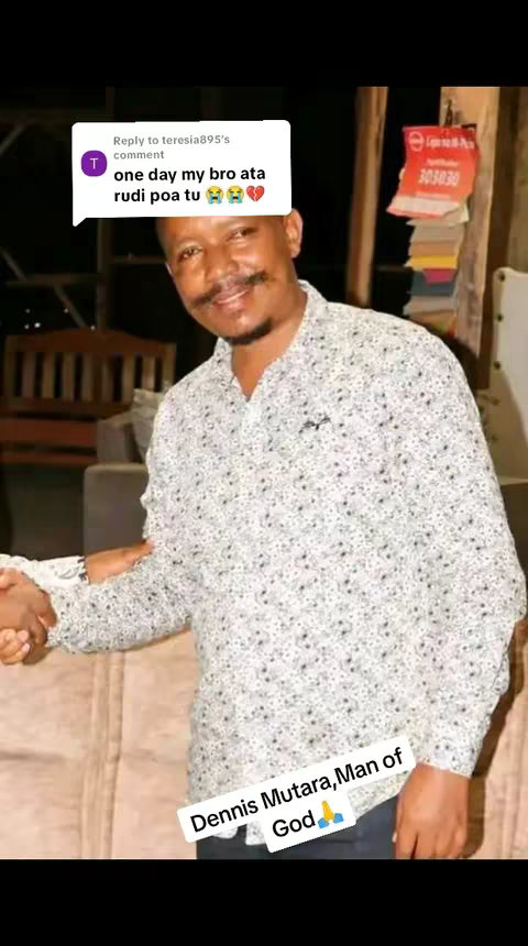 A man smiles, holding a handshake in a casual setting. A comment overlay is present, referencing a family member, while block text at the bottom calls out his name, and states that he is 'Man of God'. Background elements are slightly blurred.