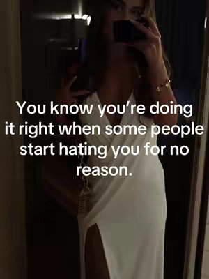 A woman in a white dress is taking a selfie in front of a mirror, with the text overlayed in white font. The overall aesthetic is clean and modern.