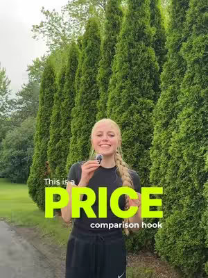 A young woman with blonde hair and a black outfit stands in front of a line of tall, green trees, holding an item in her hand and smiling at the camera. Text overlays highlight 'PRICE comparison hook'.