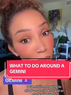 A woman is in a close-up shot, facing the camera slightly off-center. A red and white banner covering part of the frame includes white text that reads 'WHAT TO DO AROUND A GEMINI". Below it, the image has details related to a Gemini zodiac sign discussion.