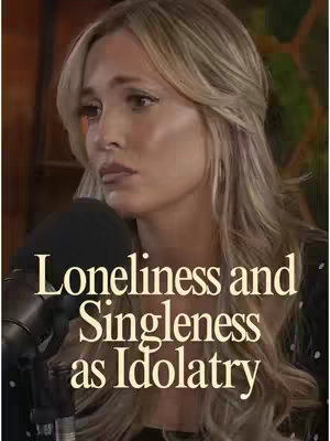 The cover image shows a woman with blonde hair speaking into a microphone. The text overlay reads "Loneliness and Singleness as Idolatry."