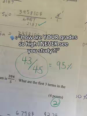 The cover image shows a sheet of paper with math problems and a circled score of 43/45 = 95%. Above the circled grade is a text overlay quote. The paper's surface is light-colored with black ink.