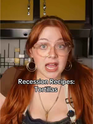 The cover image is a selfie of a woman with long, red hair. The woman is wearing glasses and has an open-mouthed expression with a look of surprise. Text overlayed reads: "Recession Recipes: Tortillas."