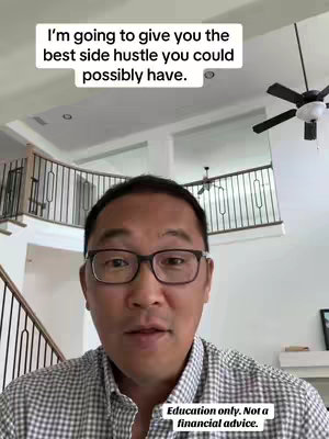 A man with glasses is centered in the frame, speaking directly to the camera against a background of a modern home interior. The top portion of the image features text overlaid in a white rectangular box. The backdrop includes a staircase with a metal railing, a high ceiling, and partial view of a ceiling fan, creating a bright and open feel. At the bottom, smaller text is added.