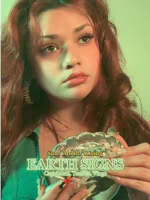 A young woman with long wavy auburn hair gazes upwards with a thoughtful expression. She is holding an ornate glass object in front of her, with a green-tinted background. Text overlays in a stylized font are positioned in the lower center.