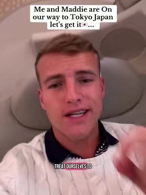 The cover image shows a man in a white sweater speaking to the camera with text overlays at the top and bottom. The background appears to be inside an aircraft.