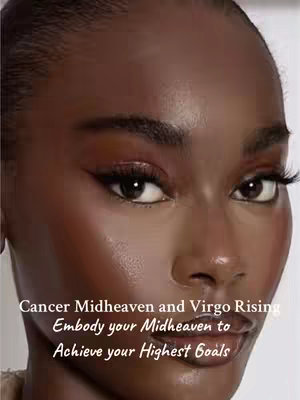 The cover image is a close-up shot of a person's face. The person has dark skin, with soft lighting highlighting their features. They have dark eyes with prominent eyelashes, and expertly applied makeup including eyeliner and lip color. The background is a muted gray; text overlays the image.