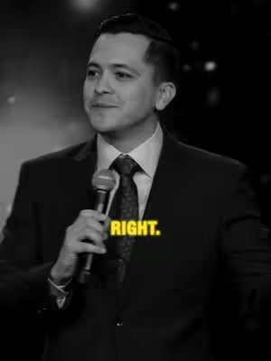 The cover image is a black and white shot featuring a man in a suit and tie. He is positioned center-frame, holding a microphone and appears to be speaking or presenting. The background is a dark, blurred setting, likely a stage or event backdrop. A text overlay reading 'RIGHT.' in a yellow font is placed over his chest.
