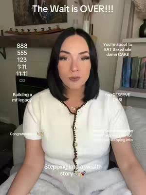 A woman is centered in the frame, seated in front of a neutral-toned background that hints at a living room setting. She is wearing a white and cream colored sweater. Text overlays, displayed in various positions, include numerical sequences, inspirational phrases, and motivational words. The overall composition features a blend of personal expression with visual elements.