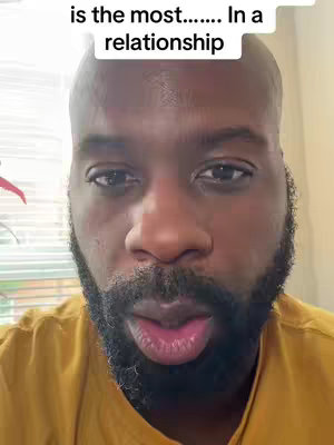 The cover image features a close-up of a Black man's face, with text overlayed at the top. He has short, dark hair and a neatly trimmed, dark beard. He's wearing a yellow shirt. The focus is on his face, with a neutral expression. The background is subtly blurred.