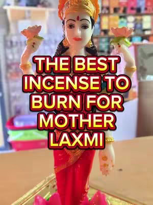The cover image features a statue of a goddess. The text 'THE BEST INCENSE TO BURN FOR MOTHER LAXMI' is overlaid in a vibrant yellow and red color scheme. The image has a warm, inviting tone, suggestive of spirituality and devotion.