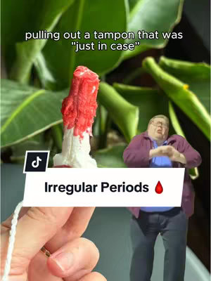 The cover image features a close-up of a tampon with a person holding it, and a humorous stick figure in the background. The words 'pulling out a tampon that was "just in case"' are in text at the top, and the text 'Irregular Periods' is on a white bar at the bottom with a drop of blood icon.
