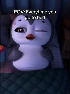 The cover image features an animated penguin character lying in a bed. The penguin has a neutral expression with one eye closed as if winking. The setting is a dimly lit room with visible bedsheets and a pillow.